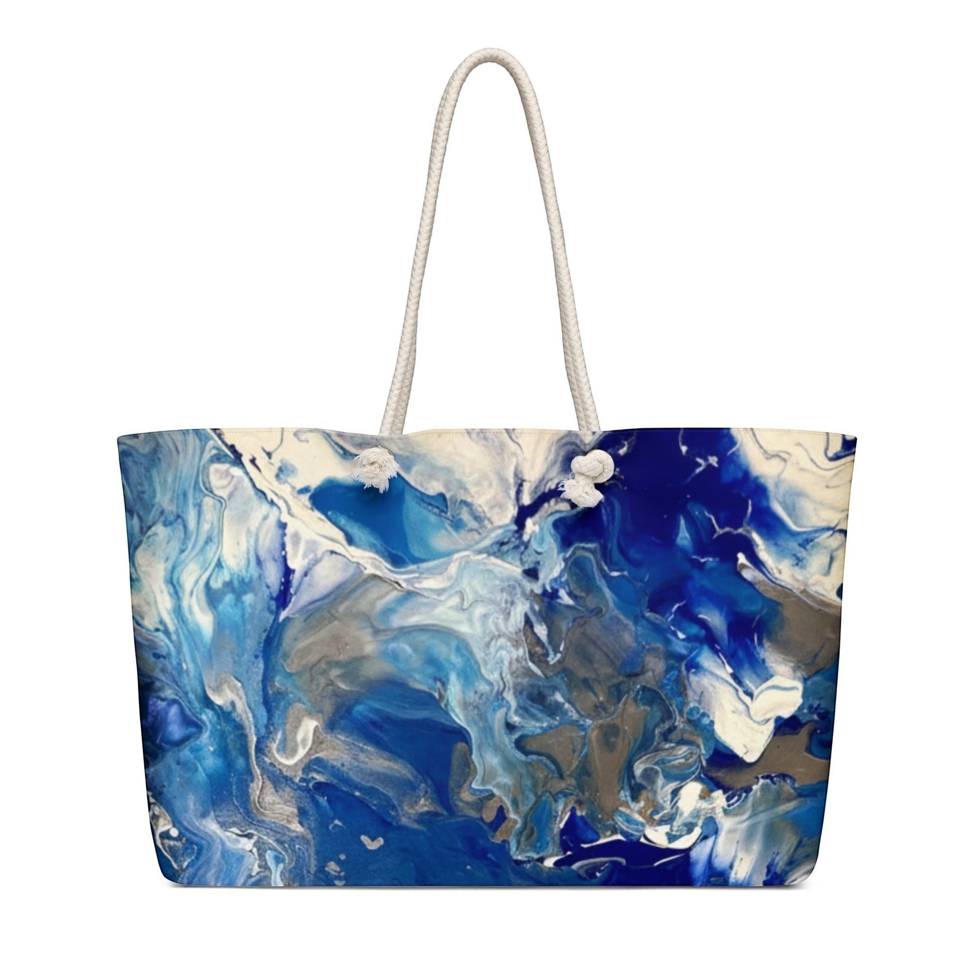 My Store weekender bag with abstract blue and white marbling print, rope handles, and cream interior lining.